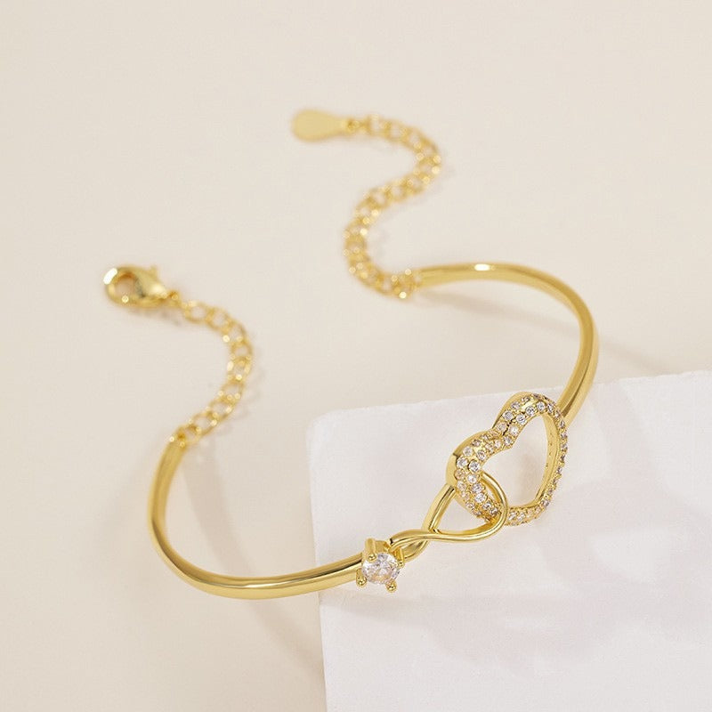 Sparkling Infinity Heart Bangle Bracelet for Women Silver Plated Cubic Zirconia Interlocking Endless Love Heart Cuff Bracelet Adjustable Commuter Jewelry Gift
