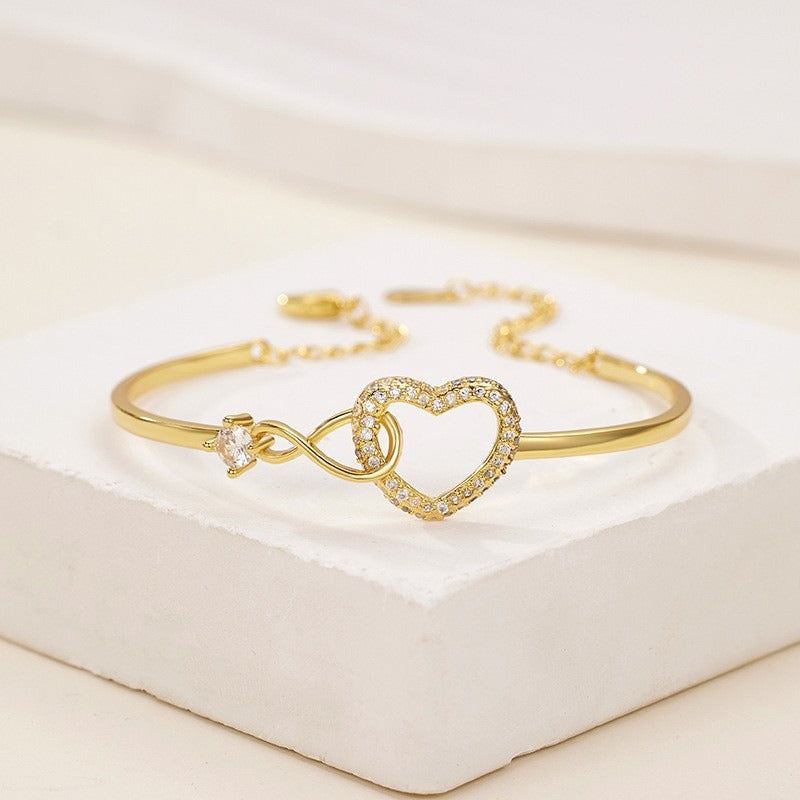Sparkling Infinity Heart Bangle Bracelet for Women Silver Plated Cubic Zirconia Interlocking Endless Love Heart Cuff Bracelet Adjustable Commuter Jewelry Gift